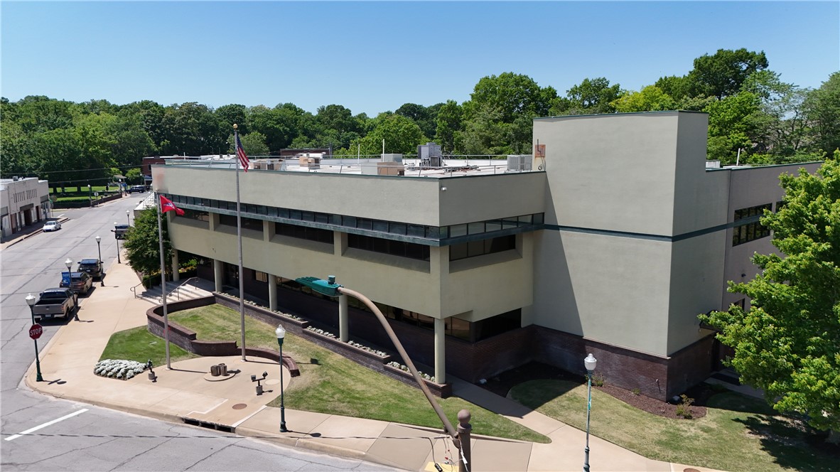 Located in the heart of Historic Downtown Siloam Springs, the building features a flexible layout including private offices,
conference rooms, and IT/server areas, making it well-suited for office, municipal, educational, or adaptive reuse purposes. Siloam Springs is a vibrant town in Northwest Arkansas near the Oklahoma border. The city is home to John Brown University and benefits from a diverse economy driven by education, manufacturing, food production, and retail sectors.
