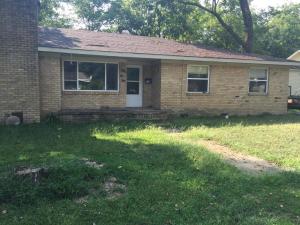 Price reduction of $9400Nice wooded lot with mature pecan trees. 2100 Sq Ft house, recent roof and windows. Needs repair. Lots of potential.Adjoining vacant lot with HYY 64 frontage is included. Possible commercial potential.