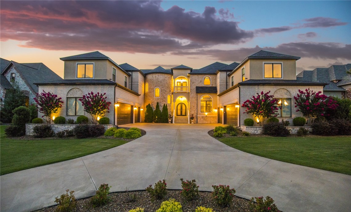 Awe-Inspiring Lavish Custom-Built Pinnacle Estate w Meticulous Detailing ThruOut & Envious Curb Appeal. Breathtaking Luxury Abound w Cathedral Ceilings, Colossal Windows w Tons of Natural Light connecting the Inside w Outside. Expansive Floorplan w Gorgeous Hardwoods & Showcase Spiral Staircase. Stunning 7179 SF features 5-6 BR/5 Full 2.5 half bathrooms/2 Bonus Rooms/2 Staircases/2 Laundry MudRooms w Fridges/Guest Bedroom w Private Half Bath & Separate Back Patio. Rare 6-Car Garage w 10 Person Storm Shelter. Exceptional Gourmet Kitchen boasts 2 Islands, Thermador 6 Gas Burner w Pot Filler & Built-in Fridge, Kitchen Aid Double Ovens & Microwave, Wine Cooler, Tons of Custom Cabinets. Hearthroom w Fireplace & Sliding Doors to Patio, Office w French Doors off Kitchen. Huge Master EnSuite w Private Patio. Entertainer’s Delight w Covered Back Patio w Fireplace, TV, Built-in Grill w Mini Fridge & 2 Bar Seating Areas & Sports Court in Backyard. Truly One-of-a-Kind!! Breathe that Sigh of Relief- You’ve found Home.