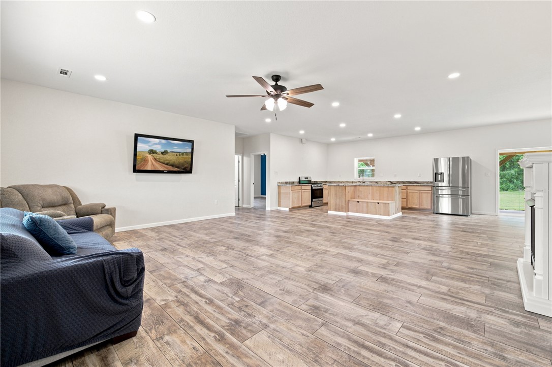 Welcome to your new slice of heaven and future homestead! Brand new build on 5.66 acres of level cleared land. Featuring a main home (built 2026 1925 sq ft) and a separate tiny home/guest home (built 2023 504 sq ft)! Primary home features a split floor plan with 3 bedrooms, 2 bathrooms, a large living room with a propane fireplace, and a dining area perfect for the family to gather.  The large kitchen is perfect for your homestead needs, preparing meals for the family, or hosting a large gathering! With low maintenance metal siding you have more time to enjoy your hobbies or to relax one of your 2 covered patios. Attached to the home is an oversized garage that can be used for a garage or as a shop. Separate tiny home/guest house is a 1 bed 1 bath home with its own kitchen, water, electric, plumbing and heating and air! Perfect for guests or to rent for passive income. Property could be used as multigenerational living or for a single family. Realize your homestead and country living dreams here!
