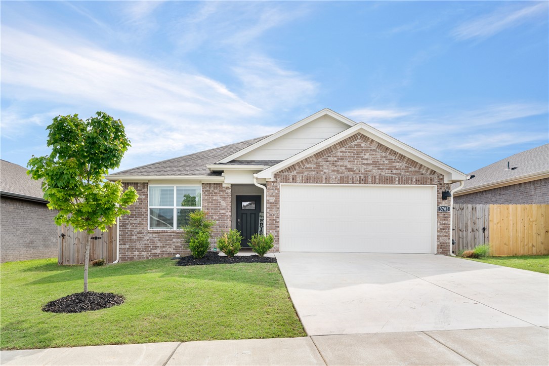 Welcome to this well-maintained 3-bedroom, 2-bath home in Springdale, offering a practical layout designed for comfortable everyday living. The main living area opens into the dining space and kitchen, creating an easy flow for daily living and entertaining, with the kitchen featuring a pantry for added storage and functionality. A primary suite provides a private retreat with its own en-suite bath, complete with dual vanities and a walk-in closet while two additional bedrooms offer flexibility for family, guests or a home office. Step outside to enjoy the covered back patio—ideal for relaxing or hosting outdoor get-togethers year-round. Conveniently located near shopping, dining, parks, and schools, with quick access to major roads for commuting. Just minutes from Tyson Foods headquarters and Northwest Arkansas Mall, this property offers both comfort and convenience in a growing area.