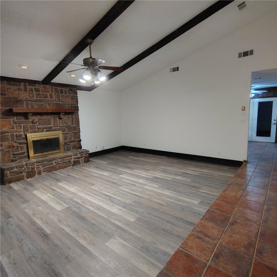 Discover comfort, space, and flexibility in this well-maintained rental home offering nearly 3,000 square feet of living space on a spacious 0.70+/- acre lot. Built in 1979, this 3-bedroom, 3-bath home provides a functional layout with multiple gathering spaces designed for both everyday living and entertaining. Inside, the home features a cozy fireplace, a large primary living area, and a second living space that offers added versatility for a media room, home office, hobby area, or additional lounge space. Central heat and air provide year-round comfort, while large windows throughout the home bring in natural light and create an inviting atmosphere. The attached 2-car garage offers convenient parking and storage, and the back porch provides a relaxing outdoor space to enjoy the peaceful surroundings of the generously sized lot. With a combination of indoor space, outdoor room to enjoy, and a practical layout, this rental offers a rare opportunity for those seeking extra space and comfort.