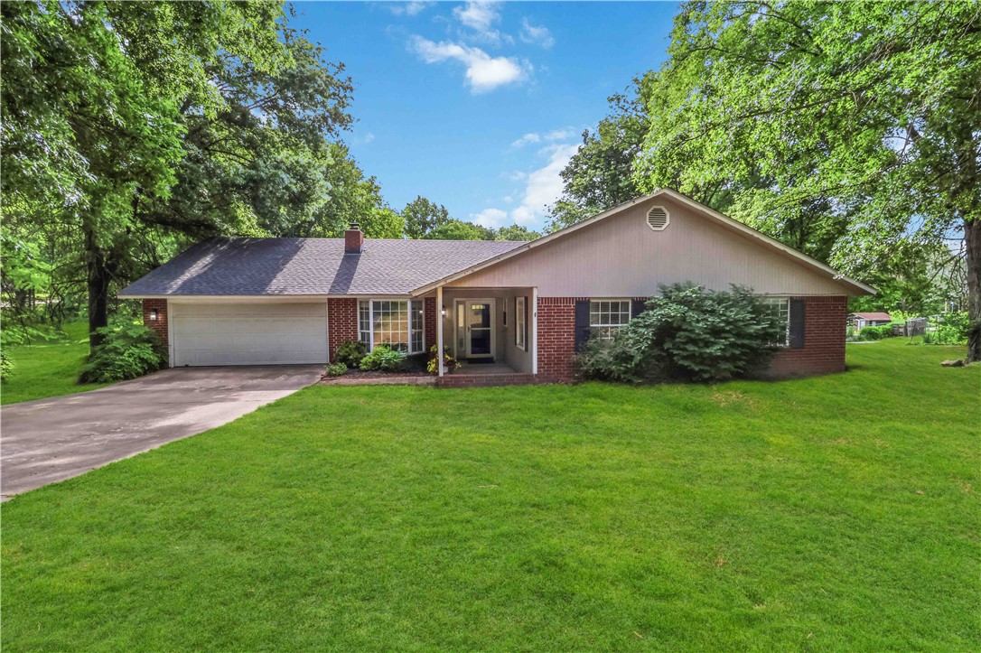 Nestled on a peaceful 1-acre lot in a quiet neighborhood, this 5-bedroom, 3-bathroom home offers the perfect blend of comfort, charm, and space. Surrounded by mature trees and serene views, the property creates a private retreat while still being conveniently close to schools and everyday amenities. Inside, you’ll find two spacious living areas designed for entertaining, including an inviting family room featuring a cozy gas fireplace. The kitchen is a true centerpiece of the home, complete with a gas range, ample cabinetry, and generous of space for gathering with family and friends. Each bedroom and living space is enhanced with specialty chandeliers imported from Austria, adding timeless elegance and unique character throughout the home. Step outside to the expansive deck overlooking the picturesque property, the perfect place to take in the peaceful surroundings. NEW ROOF installed February 2026. Selling home as-is. This home offers amazing potential with minimal improvement.