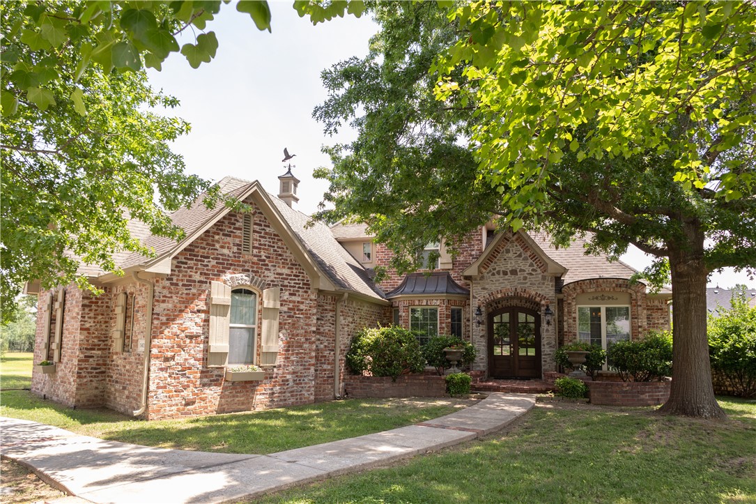 Beautifully maintained custom-built 4-bedroom, 3.5-bath home featuring a bonus room, office, formal dining room, and breakfast nook. Thoughtfully designed with several built-ins, abundant storage, and quality craftsmanship throughout. The spacious living area showcases a stunning brick gas-start, wood-burning fireplace. The primary suite offers radiant floor heating in the master bath for added comfort. Step outside to your private backyard oasis with a covered patio, pool, beautiful landscaping, sprinkler system, and a fenced backyard. Additional features include a built-in security system. Conveniently located near schools, shopping, dining, Pinnacle Hills, and walking/biking trails, this home offers the perfect blend of comfort, convenience, and privacy.