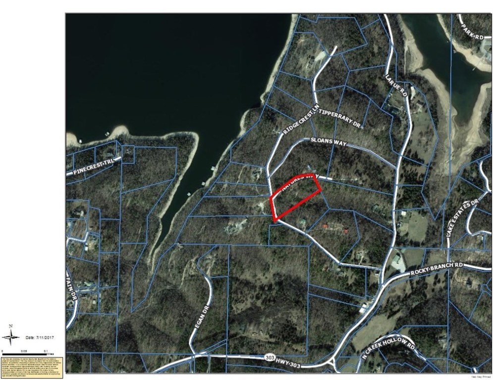 Lake area lot !!  Lake area lot !!!   Just a few short minutes from the campgrounds and public boat launch at Rocky Branch !!   Municipal water and electricity at the road.   With a little clearing, you've got the perfect place for a private hideaway at the lake !!  Build here !