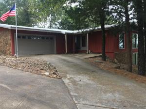 Cute home just minutes out of Russellville. This Handicap accessible, 4 bed, 2.5 Bath home overlooks town and sits on 1 acre. Private feeling and has lots of charm. Call today! More pictures coming soon!