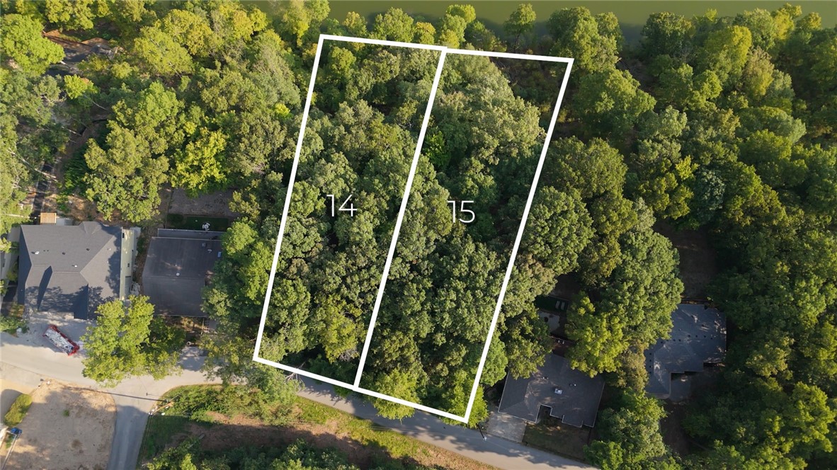 Seize this rare opportunity to own prime lakefront property in beautiful Bella Vista, Arkansas. This listing features two adjacent lots on Lake Ann, a popular ski lake, with a combined area of approximately 1 acre.
These lots offer the perfect setting for your dream home, combining the serenity of lakeside living with the excitement of outdoor recreation. Lake Ann is ideal for water skiing and various aquatic activities, promising endless summer fun right at your doorstep.
Bella Vista is known for its natural beauty and community atmosphere, offering a high quality of life with proximity to urban amenities in nearby Bentonville and Fayetteville.
Don't miss this chance to build your lakefront retreat in one of Bella Vista's most desirable locations. Whether you're looking to enjoy water activities, hit the trails, or simply relax by the lake, these lots offer the ideal canvas for your future home. Schedule a viewing today and start planning your lakeside lifestyle.
