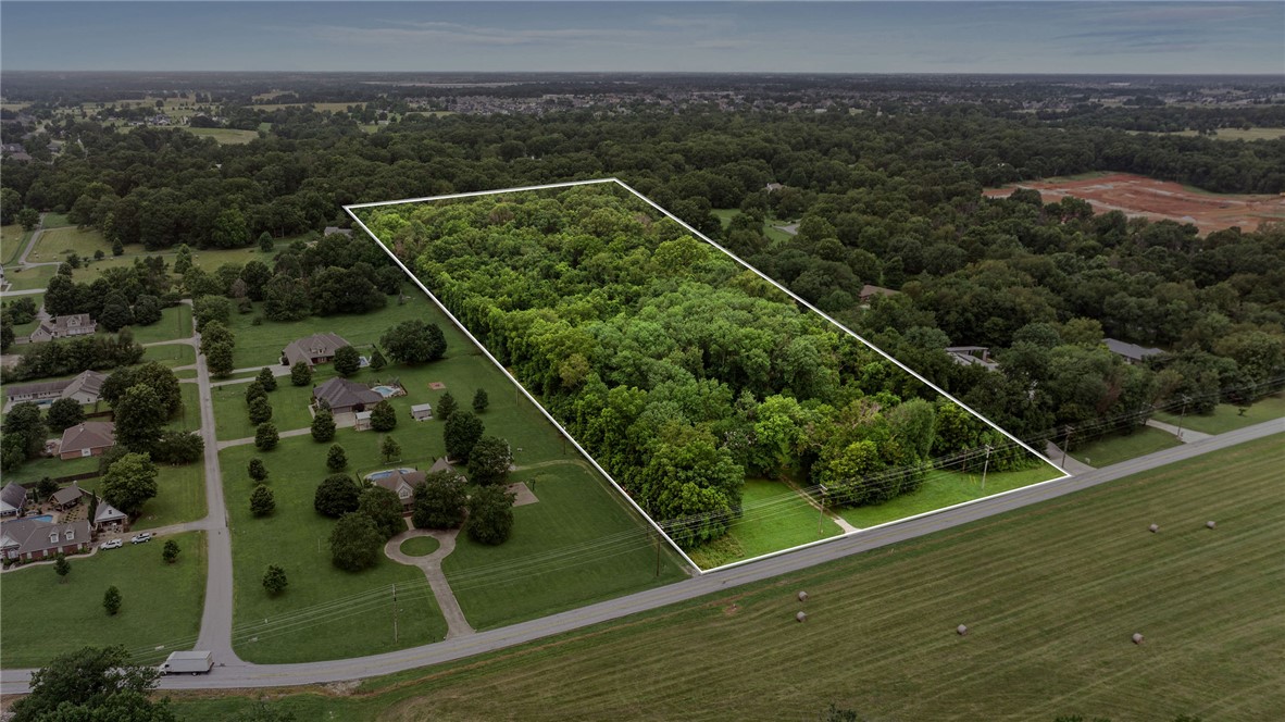 Located just west of the Pinnacle Hills district along Rainbow Road, this 9.68-acre development opportunity offers a chance to invest in one of Northwest Arkansas' fastest growing corridors.

 Surrounded by premier shopping, dining, entertainment, and Class A amenities, 2920 S Rainbow provides convenient access to I-49 and some of NWA's most desirable destinations. Designated for residential use in the City's Future Land Use Plan, the site offers outstanding long term development potential as growth continues west of Pinnacle Hills. Water, electric, and gas are available on-site, and sewer has been extended to nearby developments within approximately one-half mile, providing a clear path for future service. 

With continued investment throughout the area, this property is ideally positioned for residential development in one of the region's most sought after growth corridors.