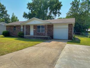 This adorable home is newly updated and a must see!  With fresh paint and new flooring it is ready for your family. This home offers 3 bedrooms, 1.5 bathrooms, and a large living room.  The attached garage would be great for extra storage or housing your lawn care tools. The backyard is fully fenced and a great place to let pets and kiddos play.