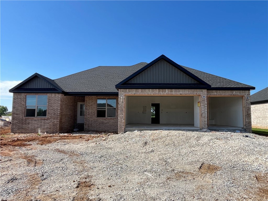 Experience the Marvin plan at Spring Creek Farms. This modern community will feature a community pool, playground and walking trails. The Marvin Plan offers refined single-level living with a thoughtfully designed 4-bedroom, 2 bath layout that blends comfort and sophistication. The open-concept design is enhanced by soaring vaulted ceilings accented with beams, and electric fireplace. The kitchen is beautifully appointed with custom soft-close cabinetry extending to the ceiling, a gas range, fully vented hood, and built-in microwave—perfectly balancing style and functionality. The primary suite is a serene private retreat, featuring a a tray ceiling in the bedroom and a luxurious walk-in shower for a true spa-like escape. A 3-car garage and a large covered patio with gas and ethernet hookups complete this thoughtfully crafted luxury design