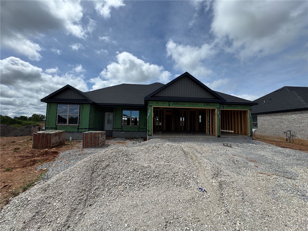 Experience the Marvin plan at Spring Creek Farms. This modern community will feature a community pool, playground and walking trails. The Marvin Plan offers refined single-level living with a thoughtfully designed 4-bedroom, 2 bath layout that blends comfort and sophistication. The open-concept design is enhanced by soaring vaulted ceilings accented with beams, and electric fireplace. The kitchen is beautifully appointed with custom soft-close cabinetry extending to the ceiling, a gas range, fully vented hood, and built-in microwave—perfectly balancing style and functionality. The primary suite is a serene private retreat, featuring a a tray ceiling in the bedroom and a luxurious walk-in shower for a true spa-like escape. A 3-car garage and a large covered patio with gas and ethernet hookups complete this thoughtfully crafted luxury design