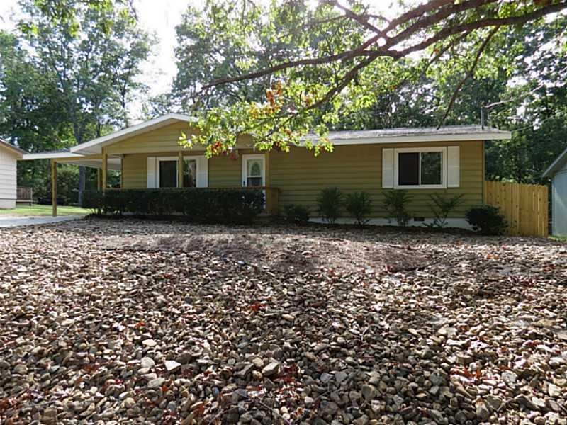 If you're looking for a cozy, beautifully kept, updated home, then this is the one for you! Brand new roof, hickory cabinets, and cedar walk-in closets give this house an outdoorsy feel. The covered deck is the perfect place to sit outside with a glass of iced tea and enjoy the backyard forest view! The kitchen is equipped with stainless steel appliances & granite countertops. Refrigerator stays.  New septic system, new hot water heater, new fans, & new fixtures make this house a bargain!