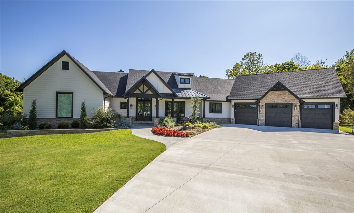 Sold prior to print. House is 2773sqft on main floor and 2422sqft in walk out basement with 10' ceilings. 50x75 heated and cooled shop building with 15x30 inside office with full bathroom