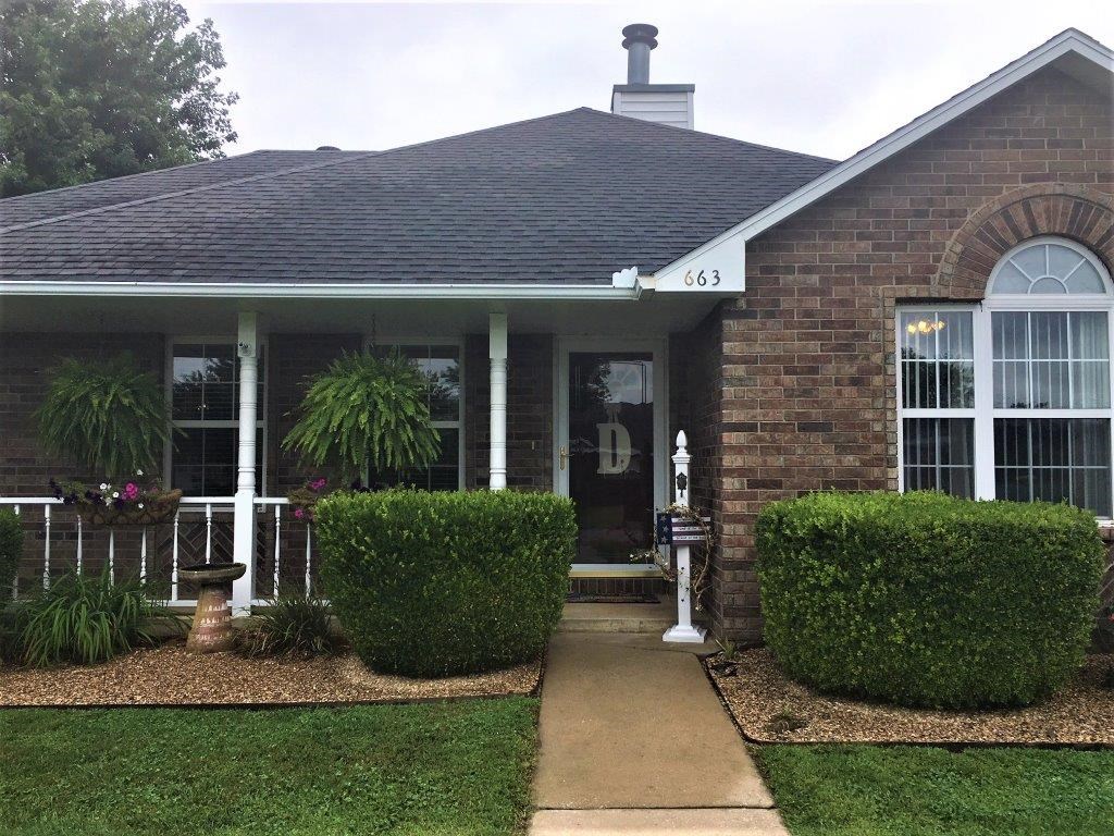 Immaculate, well maintained, all brick home on large corner lot & side entry garage.  Split floor plan 3BD/2BA with open living, dining, and kitchen.  Spectacular gas log/starter & wood burning fireplace!  Large master w/double closets.  Laundry has utility sink, pantry, & extra storage.  Large 14' x 14' wood deck is perfect for grilling!  Wood privacy fenced back yard and professionally landscaped all around.  Detached 2 car carport.  Much, much more!  MUST See!