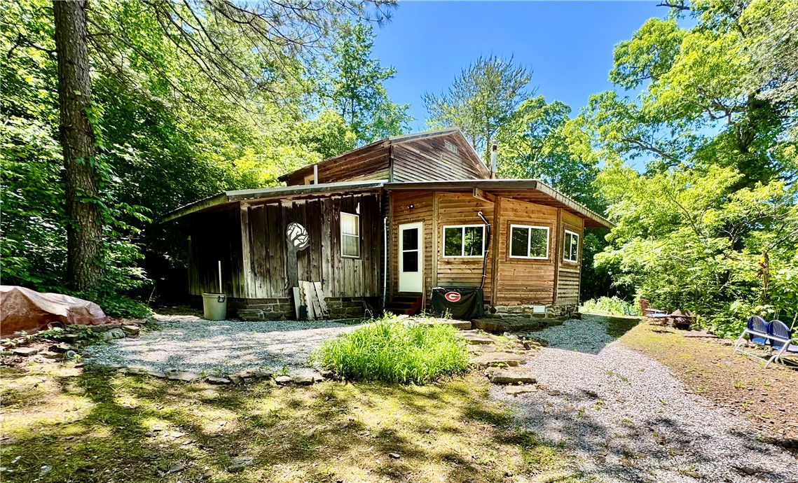 The ranch includes a spacious cabin designed to accommodate both weekend retreats and extended stays. The cabin features two bedrooms, one full bathroom, one half bath, a woodburning stove, and two separate living room areas that provide flexible gathering and recreational space. Rural water, electric service, and internet connectivity are already established on the property, supporting comfortable day-to-day use while maintaining a rural setting.