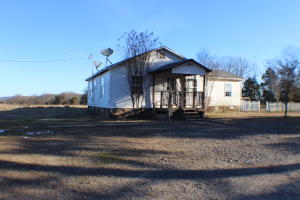 Fixer-up home on 2 acres in Dover School District. "Property is lender owned, is being sold as-is, and U.S. Bank is making no representation or warranties" . See documents for offer submittal information