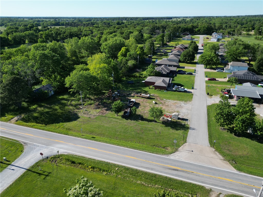 0.38-acre level open lot conveniently located close to Downtown Gentry and zoned R1-R2. This property offers a great opportunity for investors, builders, or anyone looking to build a custom home in a growing area. The lot is mostly level and open, making it ready for development with plenty of space for your future plans. Water and sewer utilities are available, adding to the property’s convenience and potential. Enjoy the benefits of small-town living while still being close to local shops, restaurants, schools, and everyday amenities. Whether you are looking for your next investment property or the perfect place to build your dream home, this lot is full of possibilities.