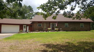 MOVE IN READY!!Just bring your furniture and start living!!!!This home has had everything re-done from the roof top to the flooring, plus a new 20x26 shop with electric.  This beautiful home offers 5 manicured acres with abundant wildlife roaming around,  mature trees,  a back deck and paved patio, plus so much more.  There are 4 bedrooms, 3 full bathrooms, an attached garage, plus an enclosed bonus room that can be used as a game room or an office.  Come take a look before it's gone.