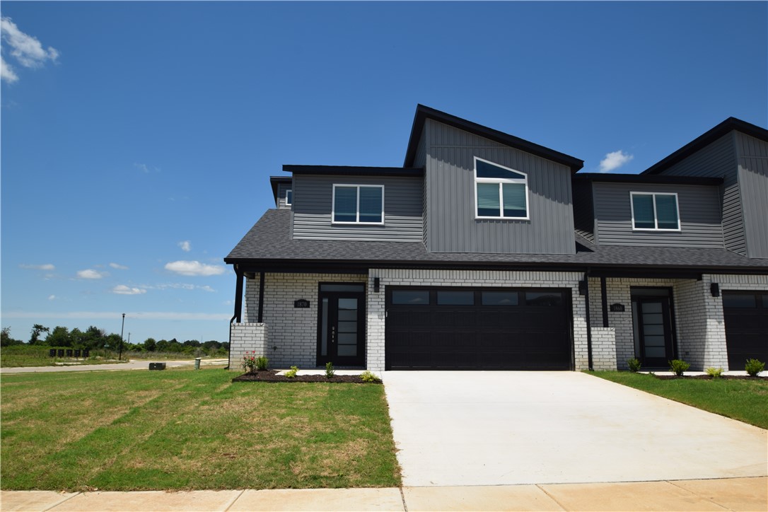 Brand new modern design! This bright 3-bedroom, 2.5-bathroom home features an open living layout with high ceilings and lots of natural light. The kitchen comes with granite countertops, stainless steel appliances, a gas range, and a large pantry. For your convenience, a brand-new side-by-side refrigerator, washer, and dryer are all included. The main-floor primary bedroom has a great walk-in shower and a huge closet. Upstairs, you will find two more bedrooms, a full bath, and extra attic storage. The home features beautiful wood-look tile in the main areas, 2" blinds, a private back patio, and a fully fenced yard. This home sits in a fantastic location within the top-rated Bentonville School District. You will love being just minutes from the walking paths at McKissic Springs Park and less than 10 minutes from the world-class trails and paths at Coler Mountain Bike Preserve.  Non smoking property and pets allowed with owner approval and additional deposit.