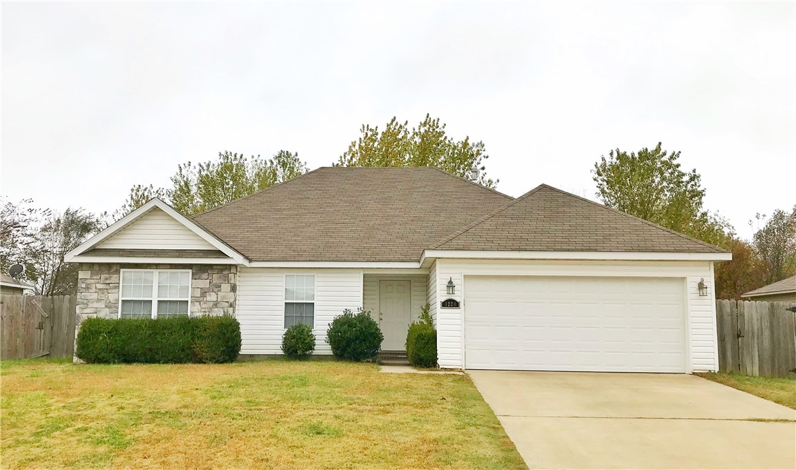 Great home with charming exterior, gas log fireplace, crown molding, vaulted ceilings, tile and carpet flooring.