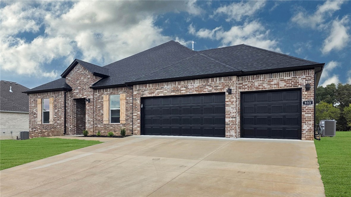 The Garland plan in Renley Rae in Springdale, AR! This plan offers 4 bedrooms and 3 bathrooms! Single-story homes feature engineered wood flooring throughout and tile flooring in the primary bathroom. The kitchen features quartz countertops, 42’’ cabinets, black hardware, and a gas range. The living room features a beautiful modern fireplace with a poplar mantle! Fans are included in all bedrooms and the living room! The primary ensuite will have a walk-in shower, separate tub, and quartz countertops! The exterior of these homes will have 4-sides brick with Hardie® siding (per plan) with a 3-car garage! Each home will have a lovely covered back patio. Taxes, HOA, and parcel TBD. Home is located within Tontitown city limits, but has a Springdale address and zip code.