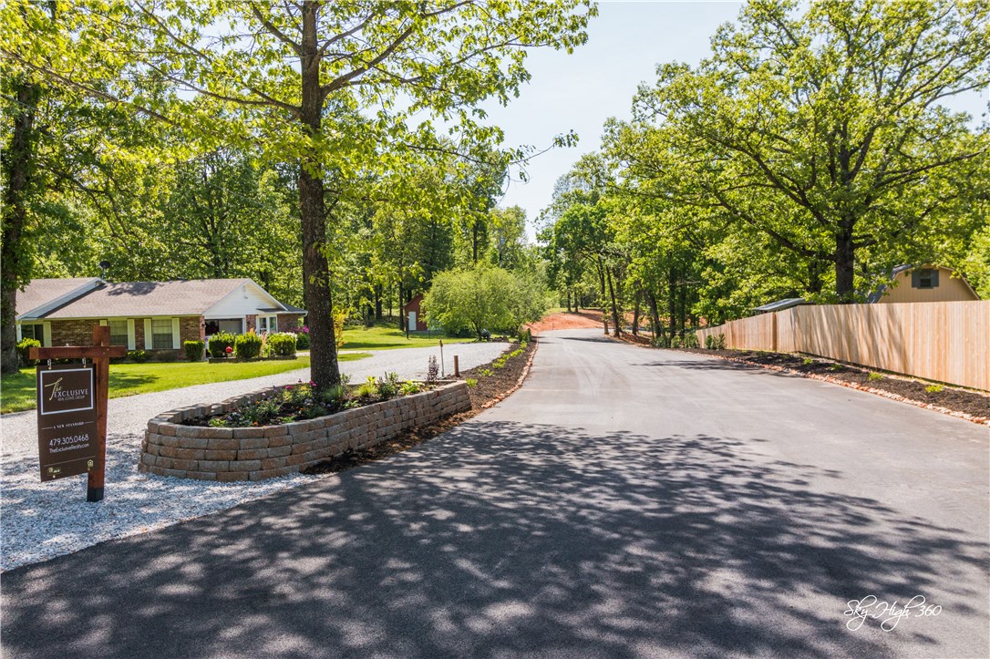 Last lot left in the Exclusive three lot neighborhood known as October View. Gated entry provides security like very few other neighborhoods in Fayetteville.  Surrounded by mature hardwoods, build your custom and have one of the most breathtaking settings in NWA. Easy access to the Uptown district of Fayetteville and Johnson interstate access. This lot has it all.