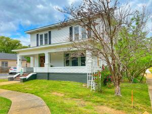 Here is an opportunity to have a beautiful home and business under one roof! This Historical Craftsman features 2976 square feet of heated & cooled living/ working space, plus a basement for storage and a sun porch. There are 8-10 parking spots for your customers and an amazing covered carport large enough for your vehicles or even a motorhome. Inside you will find spacious rooms and gorgeous woodwork. This property has many updates including fresh paint and flooring in some areas. Upstairs there are three spacious rooms that could be used for bedrooms or office space, a large bathroom as well as three smaller rooms.If you are into older homes rich in history then you need to come take a look and imagine the possibilities! Posted as both residential and commercial.