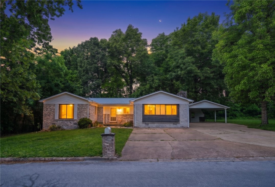 Rare opportunity in an established Harrison neighborhood! This expansive brick home sits on a sprawling double footprint, including a bonus lot that offers incredible extra outdoor space. Inside, you'll find a great floor plan highlighted by a huge bonus room, perfect for a home theater, gym, or second living quarters.

The home features durable brick construction, a metal roof, and beautiful hard flooring throughout. Featuring a cozy fireplace and generous living areas, this house offers plenty of versatile space to fit your needs. Located just minutes from shopping and dining, this property provides the perfect blend of size and stability. All information and measurements are deemed reliable but to be verified by buyer.