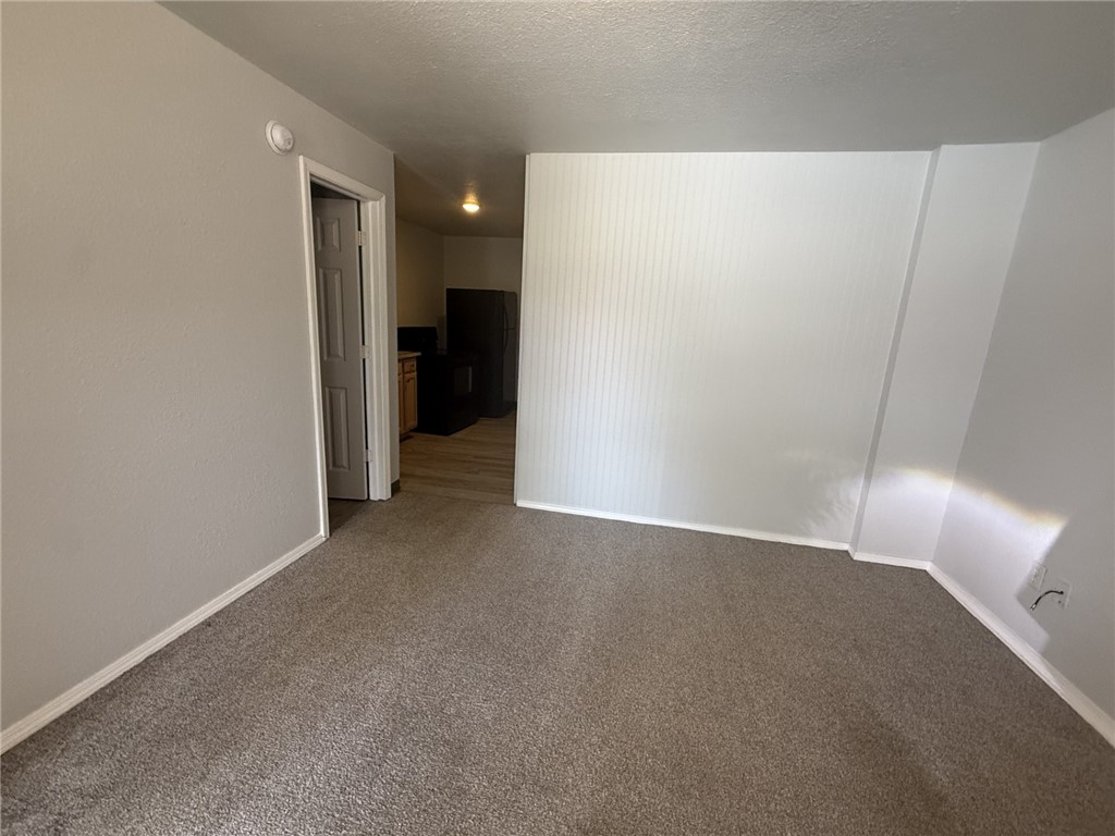 Welcome to Ozark Garden Apartments! This well-maintained studio apartment offers a functional open layout, making it an ideal space for comfortable, low-maintenance living. Rent includes all utilities and complimentary Wi-Fi, providing exceptional value and convenience. Residents also enjoy on-site coin-operated laundry. No pets and no smoking permitted. Conveniently located in the heart of Pea Ridge, you'll enjoy easy access to local shopping, dining, schools, and nearby employers, with quick access to Bentonville and Rogers.