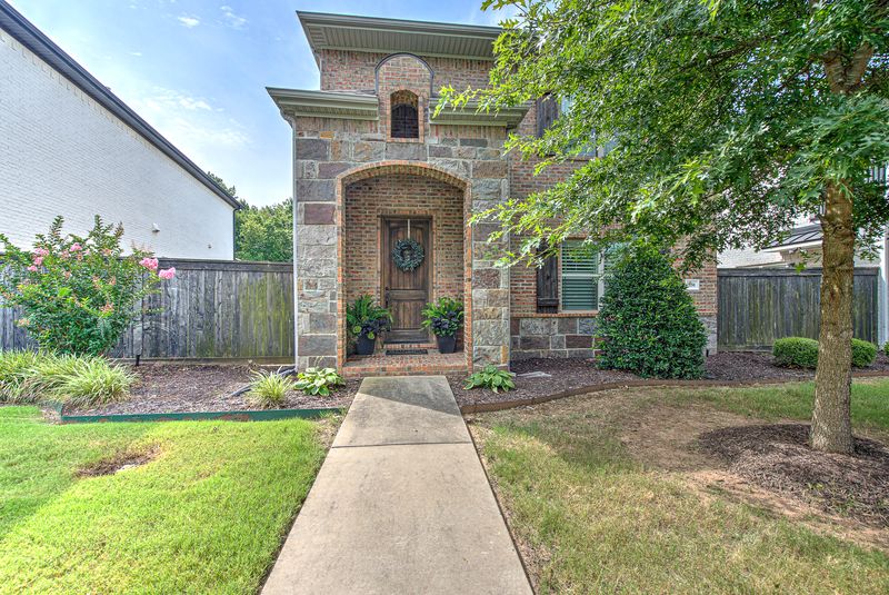 This gorgeous home is located in the highly desirable Forest Hills community in Fayetteville. Featuring 3 bedrooms and 2.5 bathrooms, this beautifully crafted residence welcomes you with a stunning two-story entryway lined with brick that sets the tone for the quality throughout. The kitchen offers granite countertops, custom white cabinetry, and a bright, modern layout perfect for everyday living and entertaining. Spacious bedrooms, thoughtful design elements, and stylish finishes make this home stand out from the rest. With its charm, craftsmanship, and prime location, this home is truly a MUST SEE!