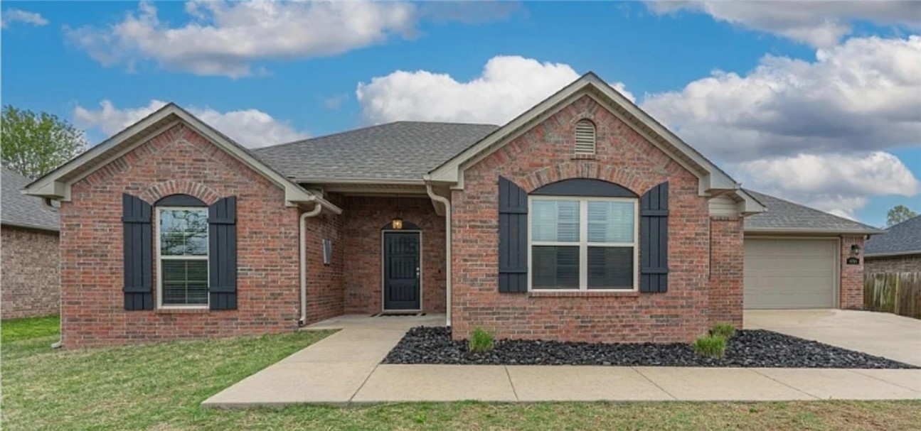 Discover this well-designed 3-bedroom, 2-bathroom single-family home in Springdale, Arkansas. Offering 1,531 sq. ft. of comfortable living space, this home features a functional layout, spacious living areas, and a 2-car garage. Perfect for families or anyone seeking a move-in-ready home with style and convenience.

2-bedroom, 1-bathroom downstairs apartment typically features an open floor plan with a cozy living room connected to a modest kitchen area. The two bedrooms are often separated for privacy, with one being slightly larger, possibly serving as the master bedroom. Both bedrooms have windows that allow natural light, and may include closet space for storage.