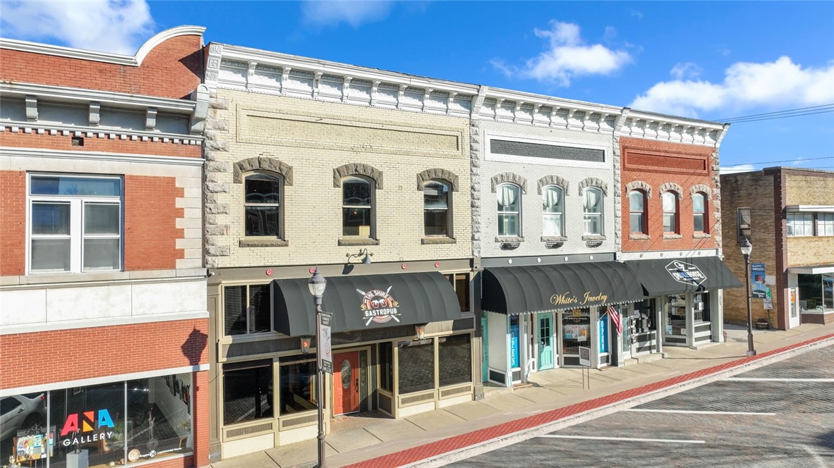 BUILDING: 3 Separate Dining Areas w/ @3,000 sq ft for Tables, Booths and Bar Seating. 2 - Main Floors, 1- Mezzanine Floor, an Outdoor Deck and 2 - Alcove Areas with Large Bay Windows for seating (or turn this area into front patio dining). 2- Separate Bars, each with 24 Tap Glycol Draft System, 4 – BA RM’s w/ Multiple Stalls, Office w/ Overlook to Main Floor. KITCHEN: Commercial Kitchen and Supporting Service Area is @ 1,700 sq ft. Food Prep Area Features Over 1,000+ sq ft area for Prep, Plating and Warming. 17’ Hood with Ansul Fire Suppression System, 2 – Walk In Coolers @10 x 8, Dishwasher Unit Hook Ups, Separate Mop Sink Area, Separate Ice Machine Nook w/ Hook Ups, Servers Station w/ Wet Sink & Under Counter Storage. Add’l 700’ sqft Storage Rooms for Dry Goods, Bulk Storage, Alcohol & Supplies, UNIQUE Side Entrance OPPORTUNITY w/@200 sqft, double doors, lighted display window w/access to kitchen. Great for Door Dash Pick-Up, Beverage Service for Entertainment District patrons or separate business idea. Phs-3 pwr