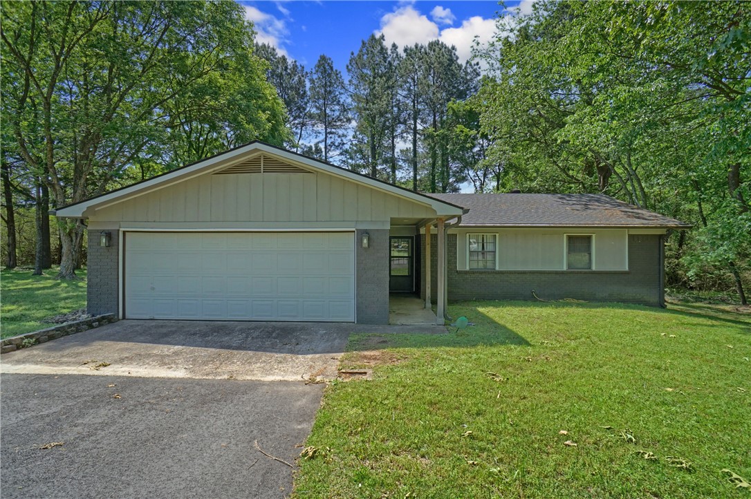 This home is a must see! If you’ve been looking for a place to call home, look no more. 3 bedroom, 2 bathroom home located less than 10 minutes north of downtown Russellville, Arkansas. Just a short drive to Lake Dardanelle and the Ozark Mountains to enjoy fishing, hiking, mountain biking & more. This home offers 1,500 square feet of living space, including a sensible kitchen w/ spacious pantry and coffee bar. Also, a fireplace is included in the cozy living room to help keep you warm during the winter. All situated on a corner lot in a quiet neighborhood and only minutes from Arkansas Tech University and the Russellville Country Club. This home is priced to sell, so don’t let it pass you up. Set up a showing today!