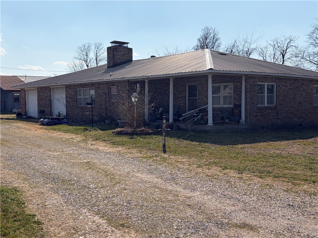 If homesteading, milk cow, sour dough, gardening and chickens are on your card, this place will have you yelling BINGO!  20 acres, plenty of pasture and a pond.  Several out buildings, nice pipe corral set up.  It's been in hay production for the last few years. This just may be the year to step into those dreams of growing your kids and food on your own dirt.  Pics of interior house coming soon, tenant occupied, trying to coordinate schedules.  Neighboring tracts available, see MLS #'s 1337744, 1337749, 1337754