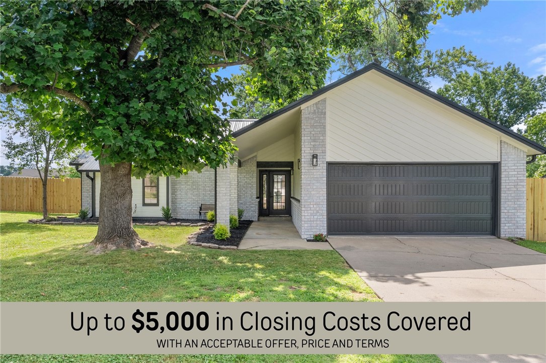 Why choose between character and convenience when you can have both? Settled in an established neighborhood, this thoughtfully reimagined home blends contemporary modern style with warm Craftsman touches-all just 1.7 miles from Sam's Club Home Office, 3.5 miles to the new Walmart Home Office, and close to miles of trails and dining.
Inside, every space has been intentionally designed. The kitchen features 3cm quartz countertops, new cabinetry, a deep single basin sink, gas range, stainless range hood, task lighting, and brand-new appliances. Grab your morning espresso from the built-in coffee bar or butlers station. Featuring boutique spa-like bathrooms. Throughout the home you'll notice details that make all the difference-arched doorways, wall sconces, custom built-ins, updated trim, new doors and hardware, luxury vinyl plank flooring, and fresh texture and paint from top to bottom. And then there's the roof. The Cadillac of metal roofing. A standing seam metal roof installed in 2024
All that's missing is you.
