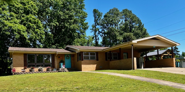 Here it is.... that comfortable, well-constructed move-in ready home you're looking for! This meticulously remodeled, three bedroom, two and a half bath brick house sits in the desirable Western Hills subdivision, only minutes from downtown, post office, industrial park, health care facilities, and high school. Interior features include LVP flooring, freshly painted ceilings and walls, a fully renovated kitchen with coffee bar, pantry and energy efficient appliances, new cabinets, farmhouse sink and more.   So many extras like the gas fireplace, jetted tub and ceiling fans make this the comfortable choice for your family.  But there's more... step outside and observe the new roof, new steel front door & shutters, double carport, flower beds and a new gazebo/patio, perfect for grilling, rest and entertaining.  You will also find a 16 x 22 workshop with electric service and separate shed for lawn equipment.  A resource binder has been prepared to document all upgrades and pertinent information for your review..