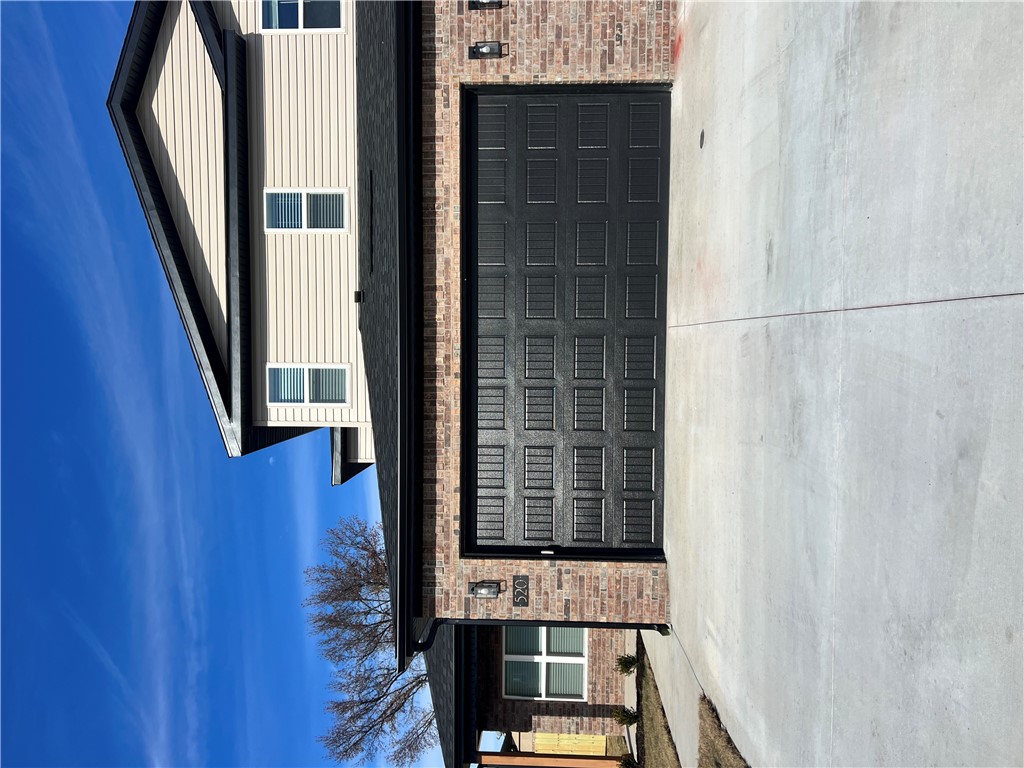 Beautiful 3BR/2.5BA duplex/Townhouse style for rent in Centerton. This home features an open layout with granite countertops, a large-capacity refrigerator, stainless steel appliances, and luxury vinyl plank flooring on main floor, with upgraded carpet in all upstairs bedrooms. Washer and dryer are included along with large storage area under the stairs! The attached 2-car garage includes EV charging plug and a wood fenced backyard to enjoy private outdoor space. Located near downtown Centerton, local schools, shopping, and the Walmart Distribution Center. Tenants are responsible for utilities and lawn care. Unit is currently occupied and will be available approximately July 15th.