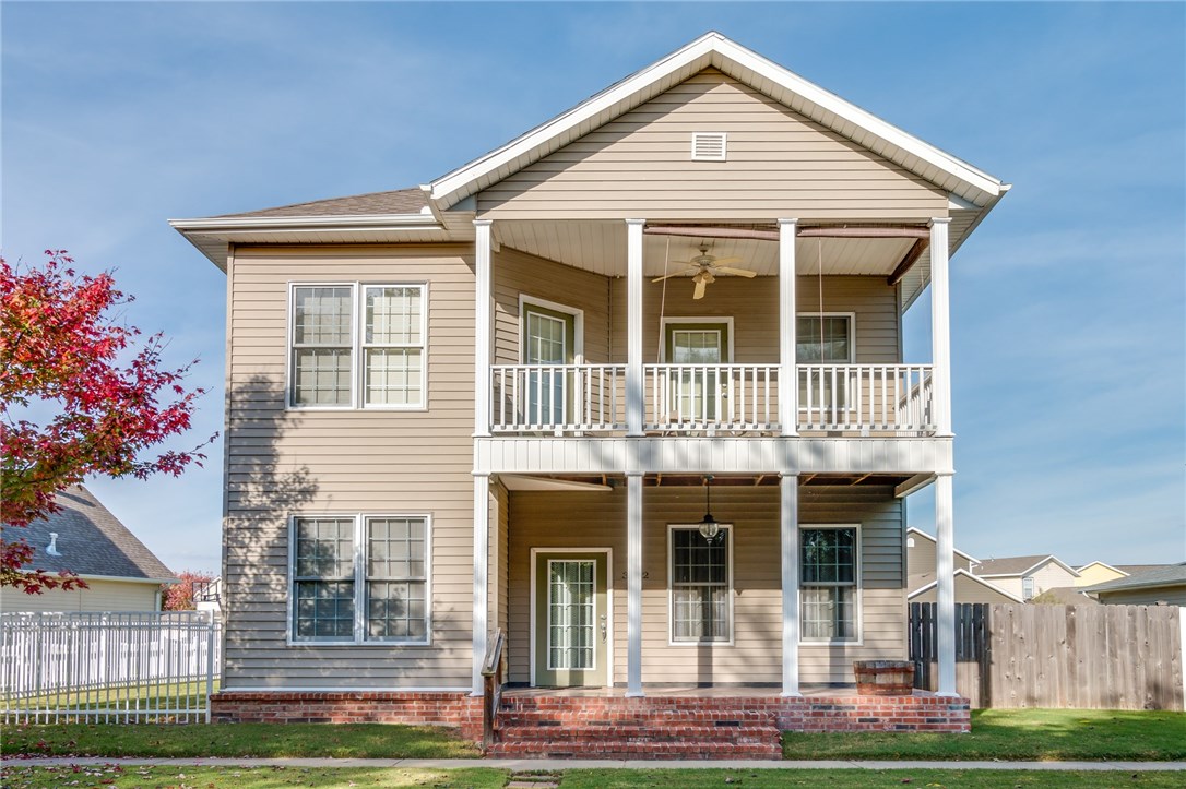 This charming home with 3 bedrooms, 2.5 bathrooms, and 2 car garage is only 2 miles from interstate 49. Many upgrades include 3 cm granite, new faucets, extended deck and paint. Features include tall ceilings throughout, kitchen bar large enough to sit 4 people, 2 fenced in yards, an upstairs balcony and walk in closets. Neighborhood has a great pool and community garden. Schedule your showing today!