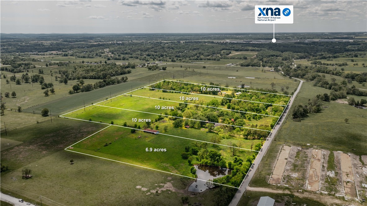 This beautiful 47 +/- acre property is currently  in 5 parcels, with the potential for reconfiguration through lot line adjustments. After a new survey, each parcel will feature frontage on Phillips Cemetery Road. Most parcels will be approximately 10 acres, with the exception of the northeast parcel, which is 6.9 acres and includes a scenic pond it is also a Seperate MLS #1352510. Located minutes from key Northwest Arkansas destinations:
12 minutes to the Pinnacle Hills area, 15 minutes to Interstate access, 20 minutes to Downtown Bentonville, and Quick access to XNA Airport. Despite its convenience, the property offers a peaceful, rural atmosphere perfect for those seeking space to enjoy nature, raise chickens, or keep a few pets. Chicken houses across road have been torn down. Whether you're looking for a serene home site or a smart investment opportunity, this land is a rare find in a rapidly growing area.