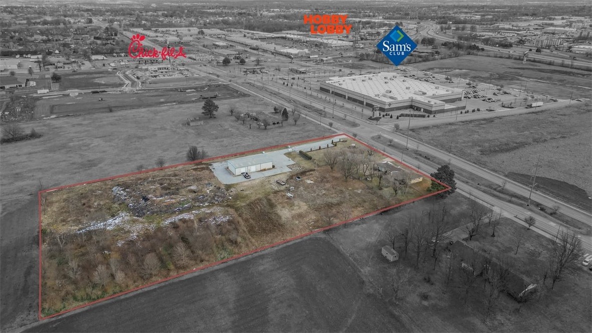 Don't miss out on this amazing C-5 zoned commercial property, on 2 parcels totaling 
+/- 5 acres ,in the quickly growing Springdale care corridor. comes with 2200 sqft office space on .90 acre 
 (vacant) & 3000 sqft warehouse on 4.10 acres lot and has Gene George Blvd Road frontage. Conveniently located next to Sam's Club, Arkansas Children Hospital, Arvest Ballpark, Arkansas Blue Cross Blue Shield, NWACC, Highlands Oncology, future development of 115,000 Sf, two story building
of UAMS Center for Orthopedics and sports medicine. Easy access to I-49 and located in the middle of Bentonville and Fayetteville.
Owner will subdivide. This property is being valued as Commercial.