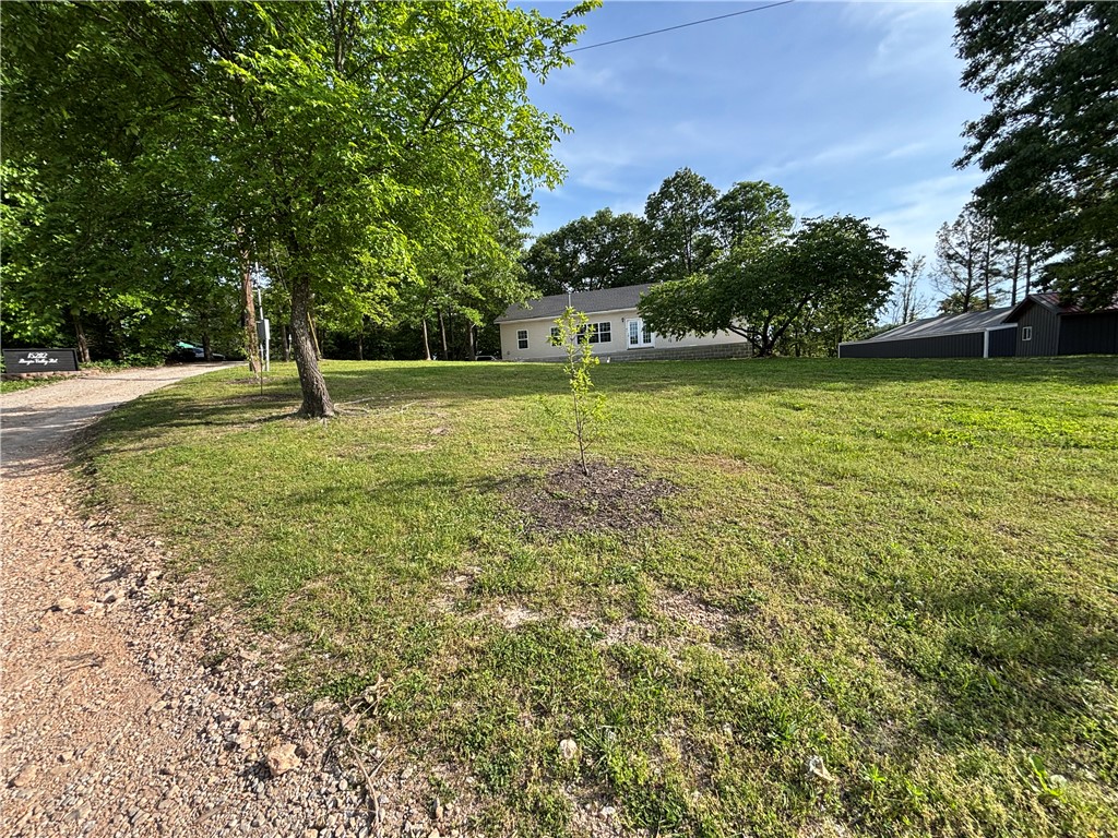 Move-In Ready Country Living on 1.94 Acres with Shop & Office Near Walmart HQ
Enjoy the perfect blend of space, convenience, and versatility with this 4-bedroom, 2-bath home situated on 1.94 acres in Northwest Arkansas. Offering 1,680 sq ft of living space, this property provides room to spread out both inside and out.

The open floor plan creates a welcoming atmosphere, featuring granite countertops and spacious living areas ideal for everyday living and entertaining. The primary suite includes a walk-in shower, jacuzzi tub, and its own dedicated water heater for added comfort.
The property features a 40’ x 40’ shop with plumbing already in place for a future bathroom, a detached 16’ x 8’ office with electricity, a barn, and a fenced area ready for animals.

New roof (2020)
New HVAC system (2021)
High-speed internet available
Crawl space foundation
No HOA and no restrictions
Approximately 11 miles from the new Walmart Home Office