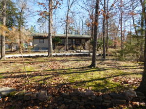 Home and acreage near Little Buffalo River! This home and 10 acres total (with 9 acres of timber) is located in the Ozark Mountains and Buffalo River National Park region of Arkansas. This could be a starter home or used as rental property for weekend guests or used as a bed and breakfast. Located in beautiful Newton County, Arkansas! Excellent habitat for deer and turkey hunting.
