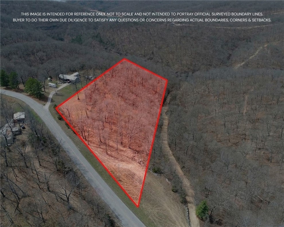 Experience the pinnacle of Ozark living on this stunning 5-acre lot perched along Indian Creek Road, where panoramic views of Beaver Lake take center stage. This rare property offers the perfect canvas for your dream home, blending high-elevation vistas with the serene privacy of mature Northwest Arkansas timber. You’ll enjoy the ultimate outdoor lifestyle with the Devil’s Eyebrow Wildlife Management Area within walking distance for hiking, while convenient boat ramps are just a short drive down the road. Despite the feeling of a remote sanctuary, you are located only 25 minutes from the vibrant dining and shopping of downtown Rogers. It is truly the best of both worlds—unspoiled natural beauty and quick access to the booming amenities of the NWA metro. Whether you are looking for a weekend retreat or a permanent estate, this acreage delivers a front-row seat to the best sunrises on the lake. Don’t miss this chance to own a piece of the ridge in one of the area's most sought-after scenic corridors.