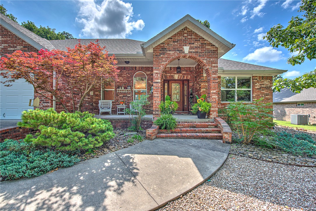 Rare golf-front opportunity! This beautifully maintained 3-bedroom, 2-bath brick home with a 3-car garage is perfectly situated on the 8th hole of the highly desirable Highlands Golf Course and just minutes from the Highlands Golf Clubhouse. Designed for comfortable living and entertaining, the home features a spacious living room, formal dining area, new site-finished hardwood floors, and a large eat-in kitchen with granite countertops, abundant cabinetry, and generous workspace. The heated and cooled sunroom provides additional year-round living space with peaceful golf course views. Step outside to a large deck featuring an automatic retractable awning, perfect for outdoor dining, entertaining, or relaxing while overlooking the spacious backyard and fairway.  A prime golf course location combined with quality finishes, exceptional outdoor living, and close proximity to golf, dining, and amenities makes this home a must-see!