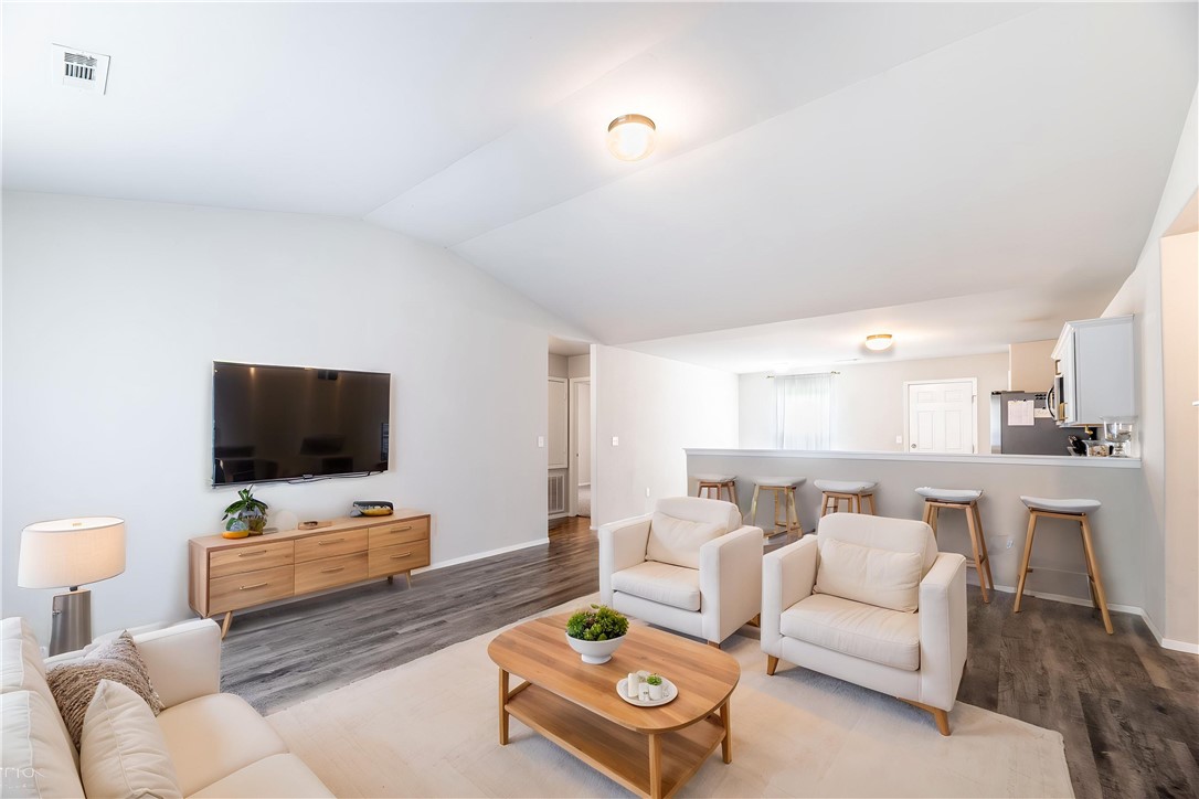Welcome to 981 Ethan James St in Elkins! Built in 2019 and lovingly maintained by its original owners, this 3-bedroom, 2-bath home offers comfort, functionality, and exceptional value. Pride of ownership is evident throughout, with thoughtful care and updates that make this home truly move-in ready. The cozy eat-in kitchen provides the perfect gathering space for everyday living, while the spacious backyard offers plenty of room to relax, play, or entertain and includes a storage shed for added convenience. The current owners have also thoughtfully converted the garage into a versatile bonus room with its own mini-split system, creating flexible space ideal for a home office, gym, playroom, media room, or hobby area. Located in a quiet neighborhood just minutes from schools, shopping, restaurants, and other everyday amenities, this home offers the best of small-town living with convenient access to everything you need—all at an incredible price!