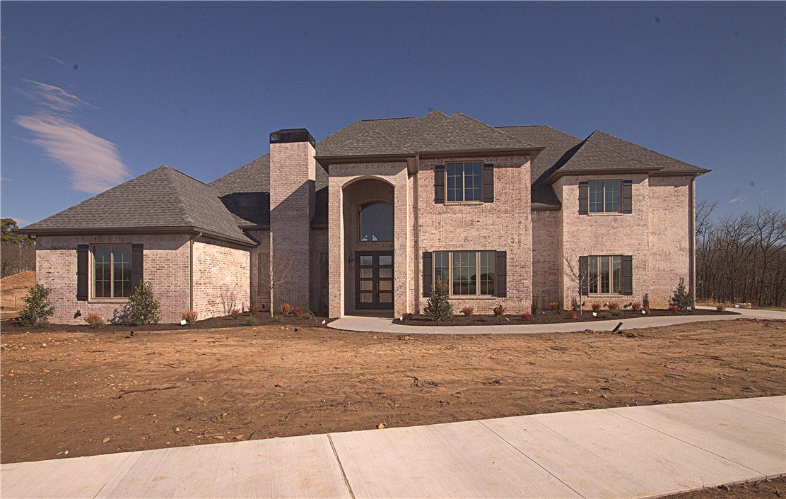 Payne Construction masterpiece... Estate home in the highly sought after gated community of Scissortail. 4 car garage, large bedrooms with walk-in closets, bonus room with wet bar and media room. Den with custom fireplace and formal dining room with easy access to the kitchen. Secondary bedroom on the main level with luxurious bathroom. All the features you want including home audio, central vac, Jenn Air appliances with a 6 burner cooktop, griddle and double ovens. Enjoy entertaining on the large covered back patio with built in grill and pergola.