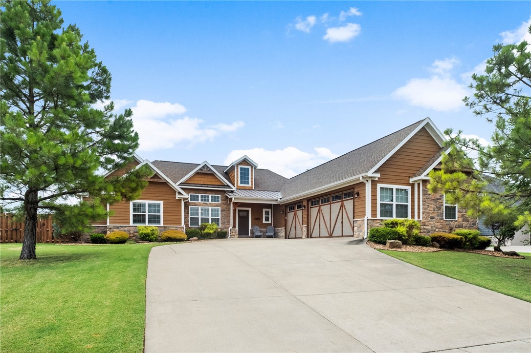 This stunning Big Sky home was built for summer entertaining. The backyard is a true retreat featuring a saltwater pool with waterfall and fire feature, built-in gas grill, separate firepit area, storage shed, and a flat yard with plenty of room for pets and play. Plus, a like-new 4-person indoor sauna with LED lighting conveys! Inside, rustic luxury takes center stage with wood beams, soaring ceilings, and two living areas, each anchored by a floor-to-ceiling rock fireplace. The kitchen offers freshly painted cabinetry, granite countertops, bar seating, an eat-in dining area, and an oversized hidden walk-in pantry, while a formal dining room provides additional space for gathering. The split floor plan includes two guest bedrooms and a spacious primary suite with an attached office/flex space and spa-like bath. Upstairs, a fourth bedroom or bonus space with a full bath offers flexibility for guests, hobbies, or a media room. Luxury and character all in one exceptional home. 1% preferred lender credit available!