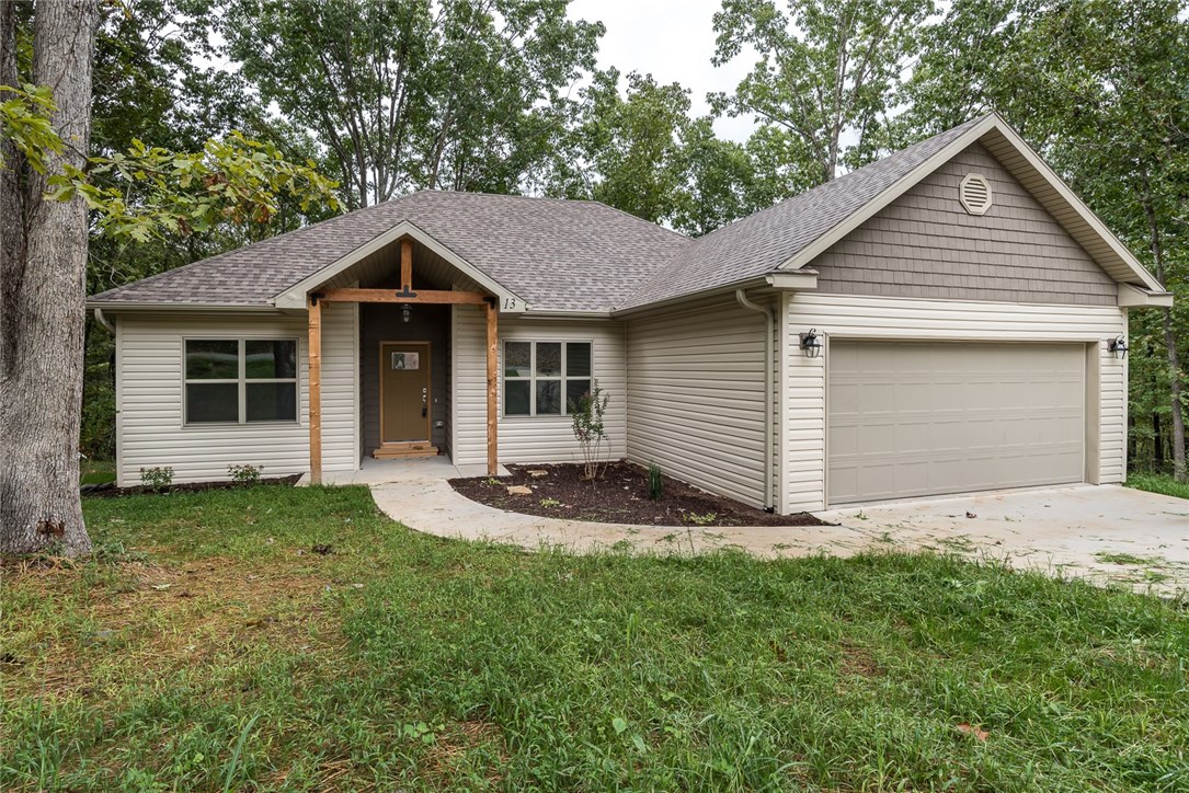Beautiful new construction home in Bella Vista. Enjoy a private, wooded setting with amazing community amenities and be close to the incredible biking trails! This home boasts a spacious and open layout, great for entertaining. Real Bamboo flooring throughout living and dining room. Marble, granite and quartz counters throughout home.Gas fireplace and large windows to wooded views in living room. Eat-in kitchen has quartz counters, stainless appliances, and plenty of storage space. Deck provides a great space for enjoying the scenery. Master suite has spa-like attached bath with jacuzzi tub and walk-in shower as well as large WIC. Two guest bedrooms and guest bathroom offer plenty of space. R19 insulation for increased efficiency. Welcome Home!