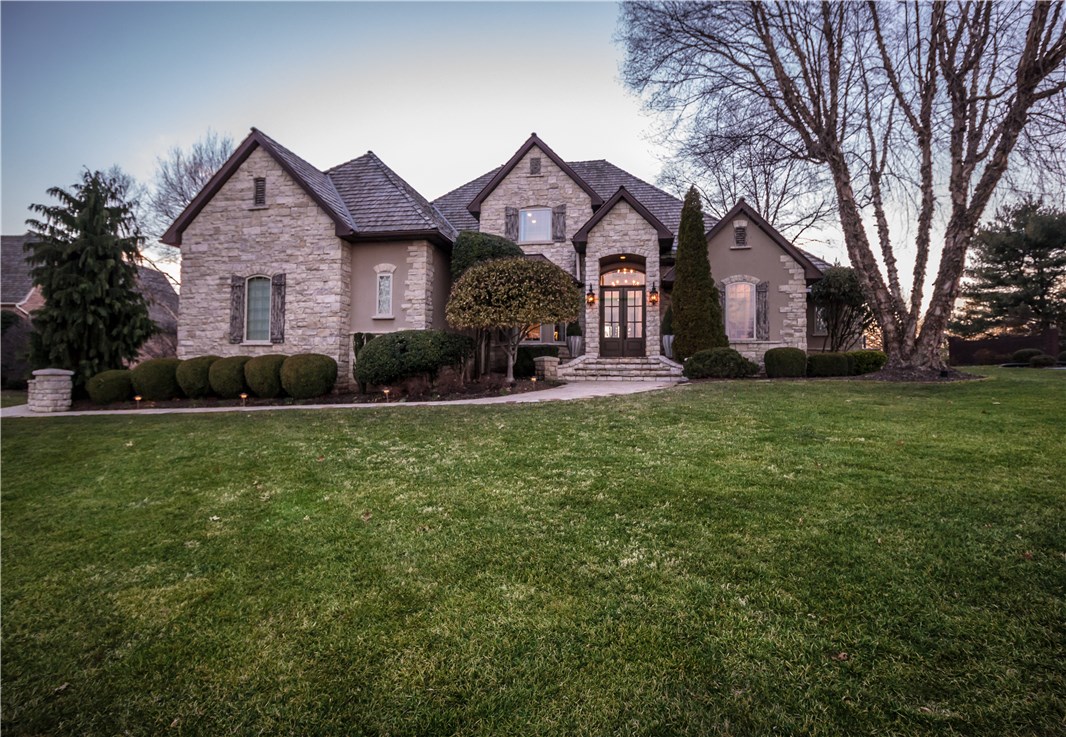 Impeccably designed golf-front estate located on Champions Drive in Pinnacle Country Club. Setting a new standard of elegance & sophistication, this home is move in ready. The wall-to-wall picture windows feature the most breath taking golf course views Pinnacle has to offer. Acclaimed design elements include: control 4 home system, designer lighting, custom cabinetry, custom concrete tile flooring, mirrored walls, built-ins, marble & granite countertops. Step outside to enjoy a large private yard with pool & water feature perfect for entertaining.