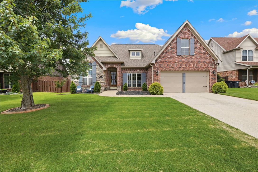 Ideally located just 0.2 miles from the Razorback Greenway Trail, this home offers convenient access to some of the area’s most desirable outdoor amenities. Head north to downtown Springdale’s shops, dining, and entertainment, or travel south another 0.2 miles to connect with the Lake Fayetteville Trail, where hiking, fishing, kayaking, and scenic nature experiences await. George Elementary and George Junior High are both located within approximately 0.5 miles. Inside, the thoughtfully designed split floor plan features a main-level primary suite, with additional bedrooms located upstairs for added privacy and flexibility. Two versatile flex spaces offer endless possibilities, whether used as a home office, formal dining room, second living area, playroom, hobby room, or home gym. Adding even more value, major system updates have already been completed, including a roof replaced within the past year and both HVAC systems replaced, providing added peace of mind for the next owner.